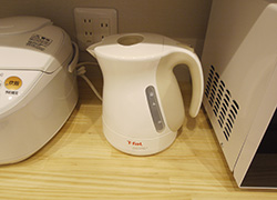 T-fal pot with boiling water in hot water