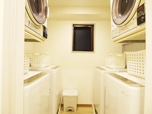 Laundry room on the 3rd floor. Coin dryer