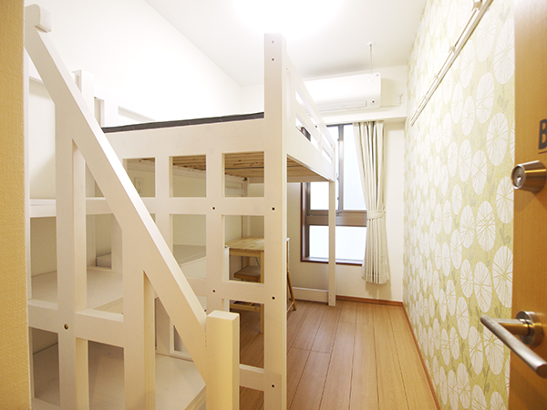 Room B01. There is a stylish loft bed.