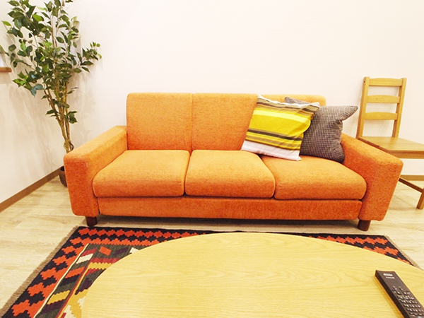 Relax on the orange sofa.