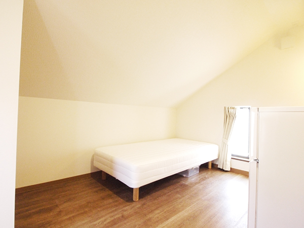 Room 302 with diagonal ceiling