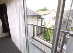 Room 201 with private balcony.