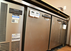 The refrigerator in the main kitchen is a professional-use large size