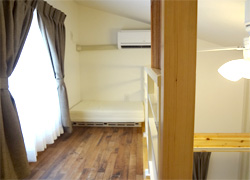 Room 203 has a large size loft (3.7m²) with a high ceiling